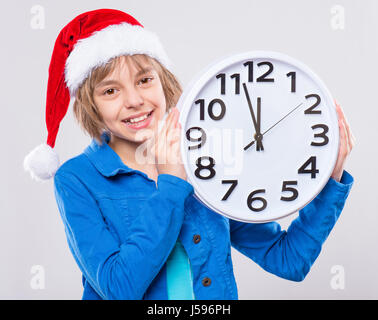 Little girl in santa hat Stock Photo