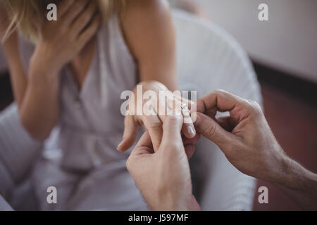 handsome man is holding woman's breast in hands and kissing her in the  neck. close up photo Stock Photo - Alamy