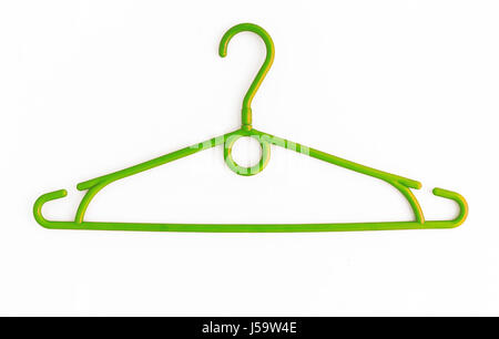 One colored plastic hanger, isolated on white background, close-up. Stock Photo
