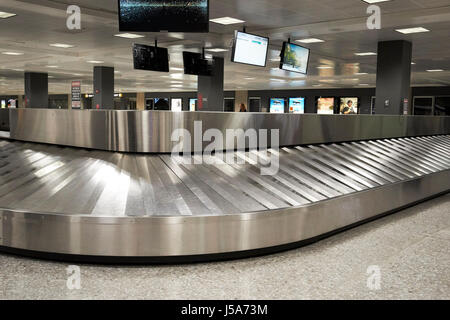 empty baggage reclaim collection area Dulles international airport serving Washington DC USA Stock Photo