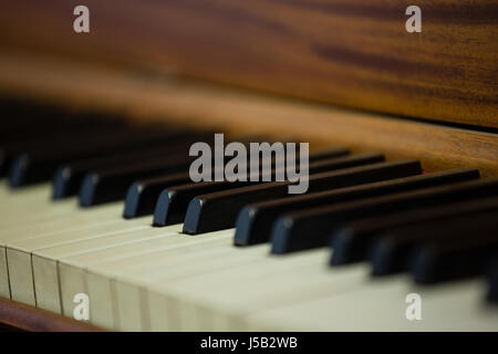 Close up of piano keys at classroom Stock Photo