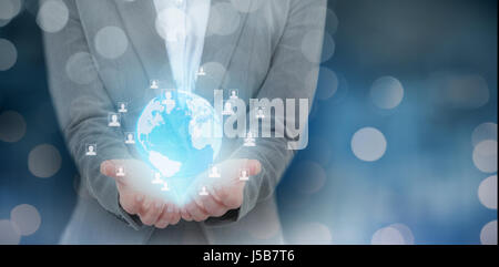 Businesswoman gesturing against white background against glowing background Stock Photo