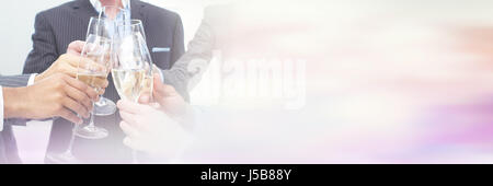 Close up of business team toasting with Champagne in the office Stock Photo