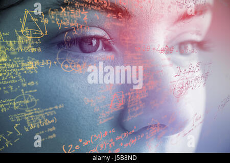 Mathematical complicated formulas against grey background Stock Photo