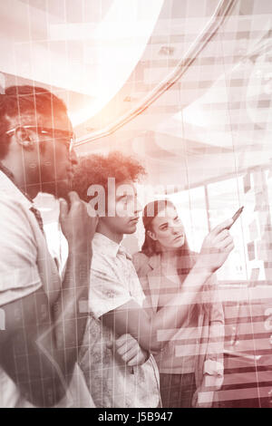 Blue data against creative team discussing over adhesive notes Stock Photo