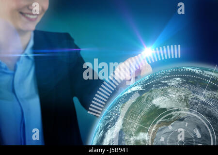Businesswoman using invisible digital screen against blue background with vignette Stock Photo