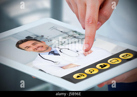 Hands using digital tablet against white background against sterile bedroom Stock Photo