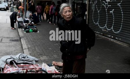 Old Folks Buying and Selling Their Belongings Yen Chow St Flea Market in Sham Shui Po  Kowloon Hong Kong Stock Photo