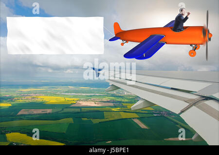 Old vintage airplane with banner ribbon Stock Photo