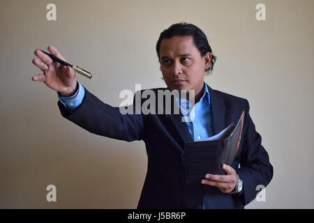 Young man gesturing, Pune, Maharashtra Stock Photo