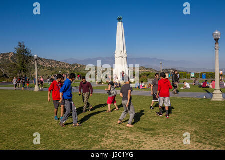 people, tourists, dancing, ethnic dance, lawn, observatory grounds, Astronomers Monument, Griffith Observatory, Griffith Park, Los Angeles, California Stock Photo