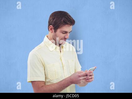 Digital composite of Businessman using smart phone over blue background Stock Photo