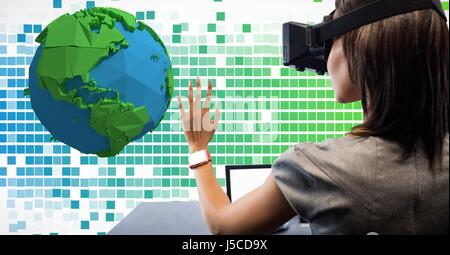 Digital composite of Woman looking at low poly on VR glasses Stock Photo