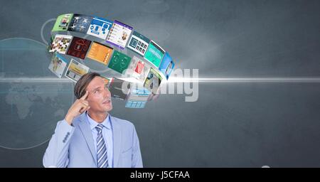 Digital composite of Businessman with flying panels over head Stock Photo