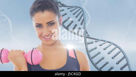 Digital composite of Woman lifting dumbbell against DNA structure Stock Photo