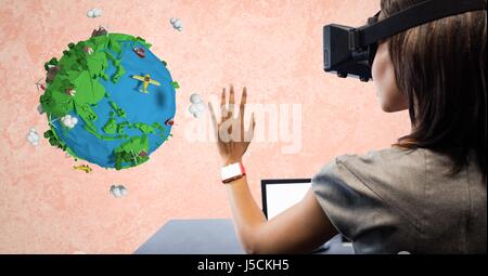 Digital composite of Businesswoman wearing VR glasses with low poly earth in background Stock Photo