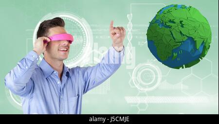 Digital composite of Businessman wearing VR headphones while gesturing by low poly earth Stock Photo