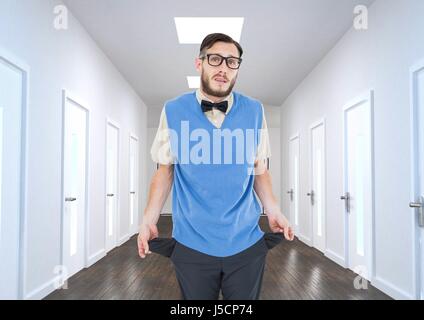 Digital composite of Young businessman with empty pockets in office Stock Photo