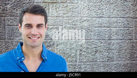 Digital composite of Confident man smiling against wall Stock Photo