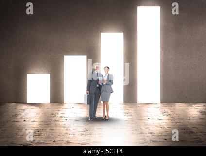Digital composite of Business people standing against bar graph on wall Stock Photo