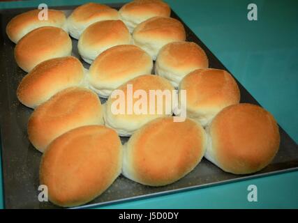 Pandesal or bread of salt is a popular bread bun in the Philippines usually dipped in hot coffee or stuffed with corned beef, fried egg or others. Stock Photo