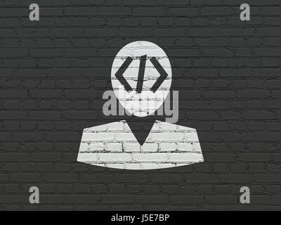 Software concept: Programmer on wall background Stock Photo - Alamy