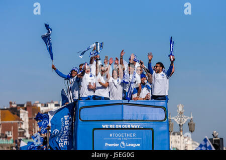 Players From Brighton and Hove Albion FC Take Part In An Open Top Bus Parade To Celebrate The Clubs Promotion To The Premier League, Brighton, UK Stock Photo