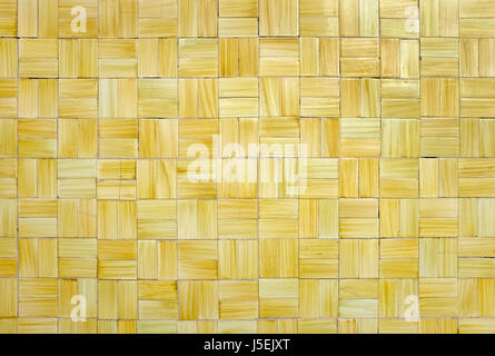 small yellow tiles on house wall, sardinia, italy Stock Photo