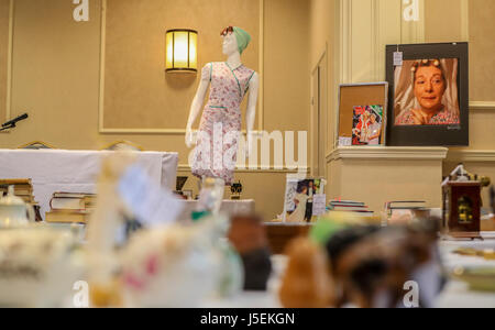 A sale of items, including the curlers, pinny and a headscarf worn by Coronation Street actress Jean Alexander, who played the soap's battleaxe Hilda Ogden, at the Royal Clifton Hotel, in Southport. Stock Photo