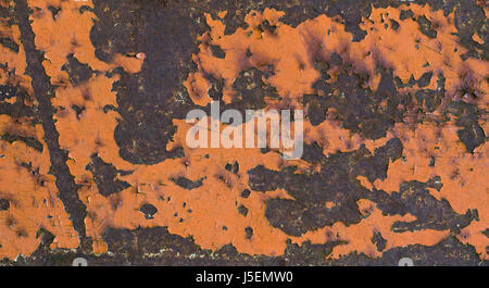 Rusty iron metal surface with orange paint. Texture and background Stock Photo