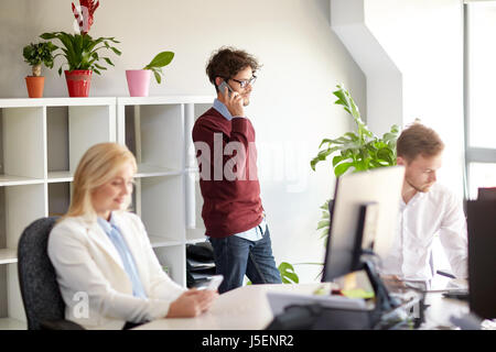 business team with smartphones at office Stock Photo