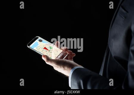 close up of businessman with gps map on smartphone Stock Photo