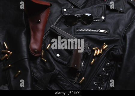 Gun Luger with cartridges and holster on the blackboard Stock Photo
