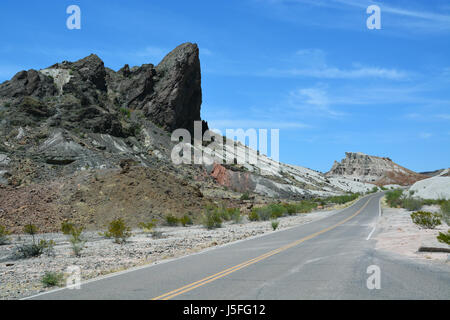 A long and open road cuts through the heart of the Chihuahuan Desert in Big Bend National Park. Stock Photo