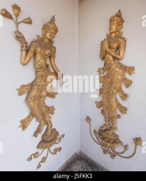 Thai style  carving art on temple wall. Stock Photo