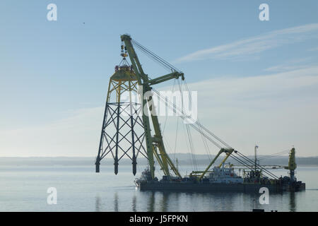 A shear leg floating crane vessel Taklift 4 transports a wind turbine platform for the Wikinger Offshore Windfarm in the Baltic Sea. Stock Photo