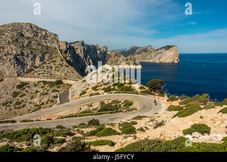 The beautiful scenic roads of the Cap de Formentor with cyclist person, Mallorca, Majorca, Balearic Islands, Spain Stock Photo