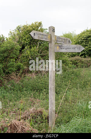 Direction signs on the south west coast path Stock Photo