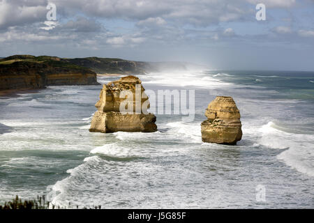 Dramatic view of two of the  'Twelve Apostles' limestone stacks, in the sea in Victoria, Australia. Stock Photo