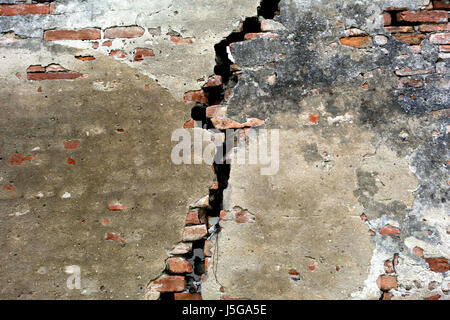 Badly cracked outer brick wall, Lombardy, Italy Stock Photo