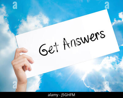 Get Answers Sign on white paper. Man Hand Holding Paper with text. Isolated on sky background.   Business concept. Stock Photo Stock Photo