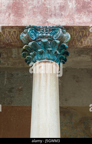 Detail of an ancient column with capital, roman architecture Stock Photo