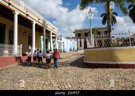 Schoolboys walking in the street in Trinidad Cuba Stock Photo