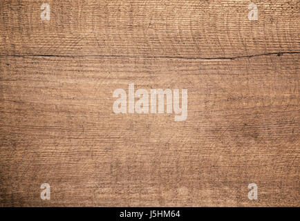 Brown scratched wooden cutting, chopping board. Wood texture. Stock Photo