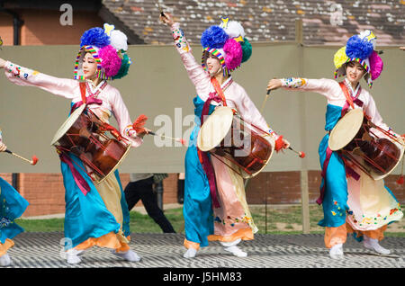 London, UK - August 15, 2009: Korean ethnic dancers perform, Jangguchum, dance with janggu, hourglass-shaped drum, in the Korean Festival on August 15 Stock Photo