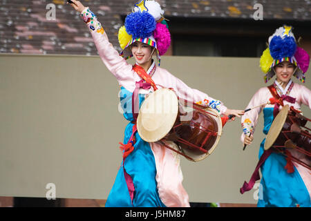 London, UK - August 15, 2009: Korean ethnic dancers perform, Jangguchum, dance with janggu, hourglass-shaped drum, in the Korean Festival on August 15 Stock Photo