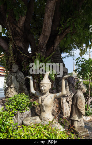 Three statues at the Wat Pho (Po) temple complex in Bangkok, Thailand. Stock Photo