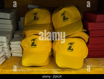 Caps for sale in the Hezbollah souvenirs shop in the tourist landmark of the resistance, South Governorate, Mleeta, Lebanon Stock Photo