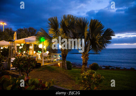 Restaurant looking out onto the Atlantic Ocean in Costa Adeje, Tenerife, Spain Stock Photo