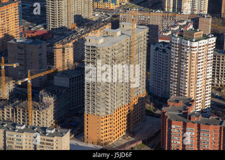 Construction site with cranes and building in Moscow region, Russia Stock Photo